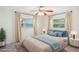 Beautifully staged bedroom with plush bedding and large windows at 1841 5Th Se St, Winter Haven, FL 33880