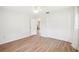 Spacious bedroom with wood-look flooring and natural light at 1841 5Th Se St, Winter Haven, FL 33880