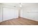 Bedroom features wood-look floors, white walls, and a closet at 1841 5Th Se St, Winter Haven, FL 33880