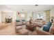 Spacious, staged living room with hardwood floors and neutral decor at 1841 5Th Se St, Winter Haven, FL 33880