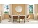 Dining room with seating for four and modern decor at 2618 Skyline Loop, Kissimmee, FL 34758