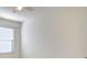 Bright bedroom features a ceiling fan and large window, offering natural light at 474 Del Sol Ave, Davenport, FL 33837