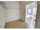 Walk-in closet leading to bath with tub/shower, offering ample storage space at 474 Del Sol Ave, Davenport, FL 33837