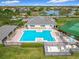 Aerial view of a refreshing community pool area with plenty of lounge chairs for residents to enjoy at 14110 Sapphire Bay Cir, Orlando, FL 32828