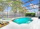 Sparkling screened pool and spa with covered lanai, perfect for outdoor living and entertaining at 14110 Sapphire Bay Cir, Orlando, FL 32828