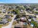 Scenic aerial view of a peaceful community with well-maintained homes and lush landscaping, creating an inviting atmosphere at 4089 Lehman Ln, Lakeland, FL 33813