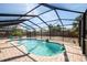 Inviting screened in pool area with brick patio at 4089 Lehman Ln, Lakeland, FL 33813