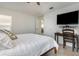 Bedroom featuring a desk, chair, and mounted television at 540 Buckingham Cir, Davenport, FL 33897