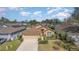 Charming one-story home with a well-manicured lawn, neutral color scheme and attached garage at 540 Buckingham Cir, Davenport, FL 33897