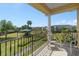 This home features a large balcony with a view of the community playground at 1529 Euston Dr, Reunion, FL 34747