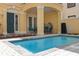 A view of the pool and covered patio space, just off the front door at 1529 Euston Dr, Reunion, FL 34747