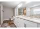 Spacious bathroom with double vanity, granite countertop, walk-in shower, and ample storage at 2155 Thompson Rd, Bartow, FL 33830