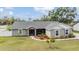 Charming single-story home featuring manicured landscaping and a stone-accented entryway at 2155 Thompson Rd, Bartow, FL 33830