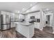 Modern kitchen featuring white cabinetry, stainless steel appliances, and a large center island at 2155 Thompson Rd, Bartow, FL 33830