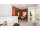 Stylish hallway area with study nook, neutral carpet, and a bright, modern design at 2537 Penguin Blvd, Davenport, FL 33837