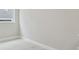 Neutral bedroom featuring tile floor and a window providing ample natural light at 6615 Quest St, St Cloud, FL 34771
