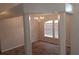 Bright dining area with tile flooring, a traditional chandelier, and lots of natural light through windows with blinds at 5118 Log Wagon Rd, Ocoee, FL 34761