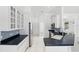 Bright kitchen features white cabinetry, stainless steel appliances, and elegant countertops at 1372 Madison Ivy Cir, Apopka, FL 32712