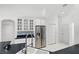 Modern kitchen showcasing stainless steel appliances, stylish cabinetry, and an undermount sink at 1372 Madison Ivy Cir, Apopka, FL 32712