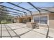 Relax in this large screened-in patio, complete with a hot tub perfect for outdoor enjoyment and entertaining at 1372 Madison Ivy Cir, Apopka, FL 32712