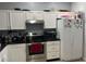 Efficient kitchen layout with stainless steel appliances and ample cabinet space at 14417 Jasmine Glen Dr, Orlando, FL 32824