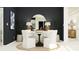Stylish dining room with a round table, white chairs, and modern decor accents at 685 Peroni Ave, Debary, FL 32713