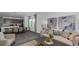 Modern living area showcasing a seamless flow between the kitchen, dining, and living spaces at 750 Honeyrock St, Debary, FL 32713