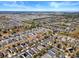 Real estate aerial shot showcasing the property's location within a community with scenic views at 754 Andalusia Loop, Davenport, FL 33837