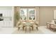 Cozy dining area with natural lighting, a modern table, and stylish decor at 761 Terrapin Dr, Debary, FL 32713
