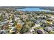 An aerial view of a residential neighborhood near a lake at 867 Hanover Way, Lakeland, FL 33813