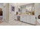 Bathroom featuring white cabinetry, tile flooring, and vanity at 867 Hanover Way, Lakeland, FL 33813