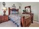 Comfortable bedroom featuring a queen-size bed and traditional decor at 867 Hanover Way, Lakeland, FL 33813