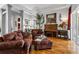 Comfortable living room featuring hardwood floors, neutral paint colors, and plenty of space for relaxation at 867 Hanover Way, Lakeland, FL 33813