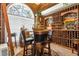 Wine cellar featuring custom storage, countertops, and climate control for the wine connoisseur at 867 Hanover Way, Lakeland, FL 33813