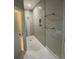 Modern bathroom with tiled shower and sleek fixtures at 261 E 5Th St, Chuluota, FL 32766