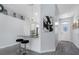 Inviting entryway with a view to the kitchen and a decorative light fixture at 3548 Galloway Oaks Ct, Lakeland, FL 33810