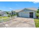Charming single-story home with a well-manicured front yard and attached garage at 3548 Galloway Oaks Ct, Lakeland, FL 33810