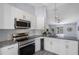 Stylish kitchen featuring stainless steel appliances, granite counters, and a wine cooler at 3548 Galloway Oaks Ct, Lakeland, FL 33810