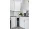 Kitchen featuring stainless steel appliances, granite counters, tile backsplash, and built-in wine cooler at 3548 Galloway Oaks Ct, Lakeland, FL 33810