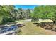 Backyard showing mature trees at 4609 Creek Meadow Trl, Lakeland, FL 33810