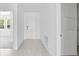 Hallway with a view of the front door and another room at 140 Jones Fish Camp Rd, Edgewater, FL 32141