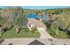 Beautiful home on a large lot with mature trees and lake view at 10837 Versailles Blvd, Clermont, FL 34711