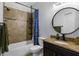 Functional bathroom featuring a shower-tub combo, toilet, and vanity with countertop at 3688 Hurlbut Cir, Lake Wales, FL 33898