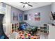 Fun bedroom featuring creative decor, colorful accents, and a unique race car bed at 3688 Hurlbut Cir, Lake Wales, FL 33898
