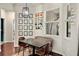 Charming breakfast nook with a modern table, bench seating, and natural light at 3688 Hurlbut Cir, Lake Wales, FL 33898