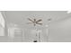 This bedroom features a modern ceiling fan and closet with lots of storage at 2415 Sutton Rd, Lakeland, FL 33810