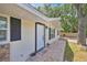Charming home featuring stylish front entrance with a new door and exterior finishes at 2415 Sutton Rd, Lakeland, FL 33810