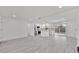 Open floor plan featuring modern updates including a stylish kitchen and plank flooring at 2415 Sutton Rd, Lakeland, FL 33810