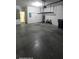 Garage space with concrete floor at 447 Wildflower Rd, Davenport, FL 33837