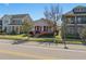 Charming home with a welcoming front porch, complemented by lush landscaping and inviting curb appeal at 9170 Tavistock Lakes Blvd, Orlando, FL 32827